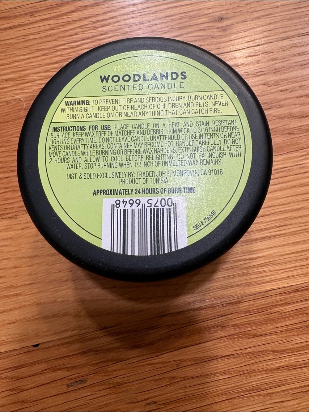 Trader Joe's Woodlands Scented Candle — Black Tin with Green Label - Picture 2 of 4